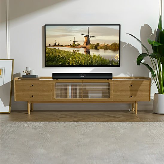 Barre de son PC sur meuble sous la télévision