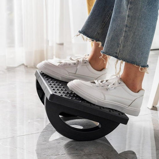 Repose pieds bureau avec jambe et chaussure blanche -Mon Univers Tecno