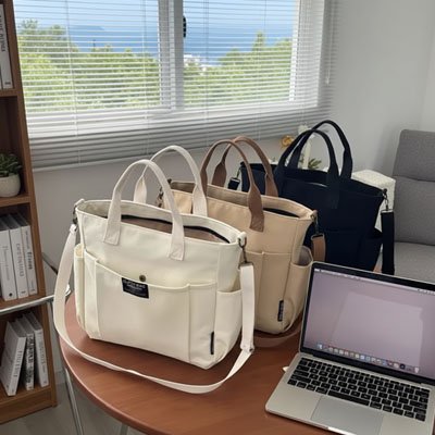 Sac ordinateur femme 3 coloris présenté